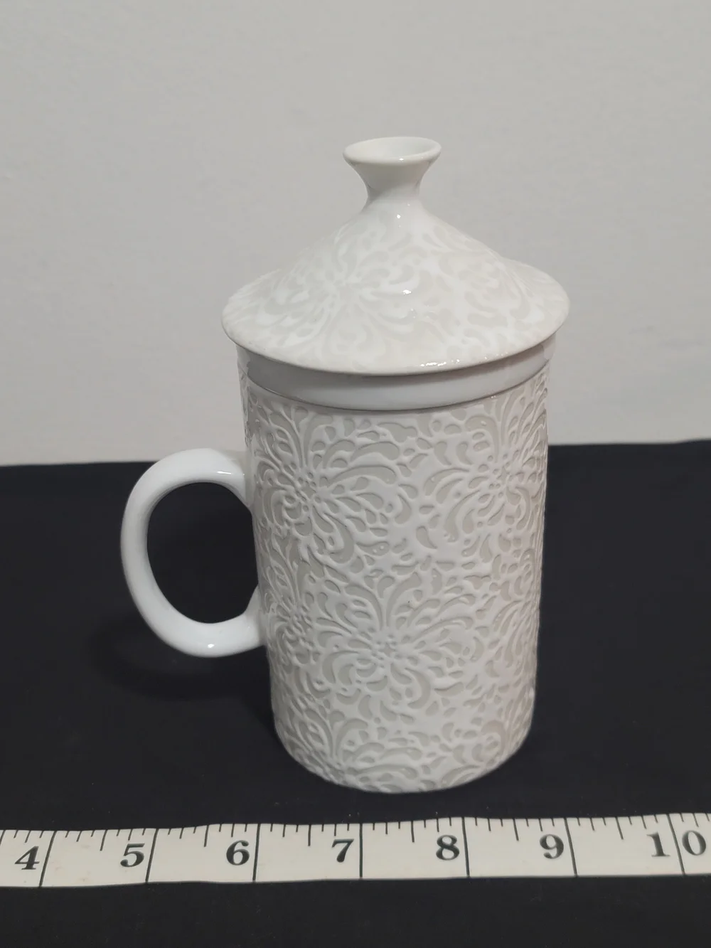Cost Plus World Market White Embossed Ceramic Tea Strainer Mug with Lid